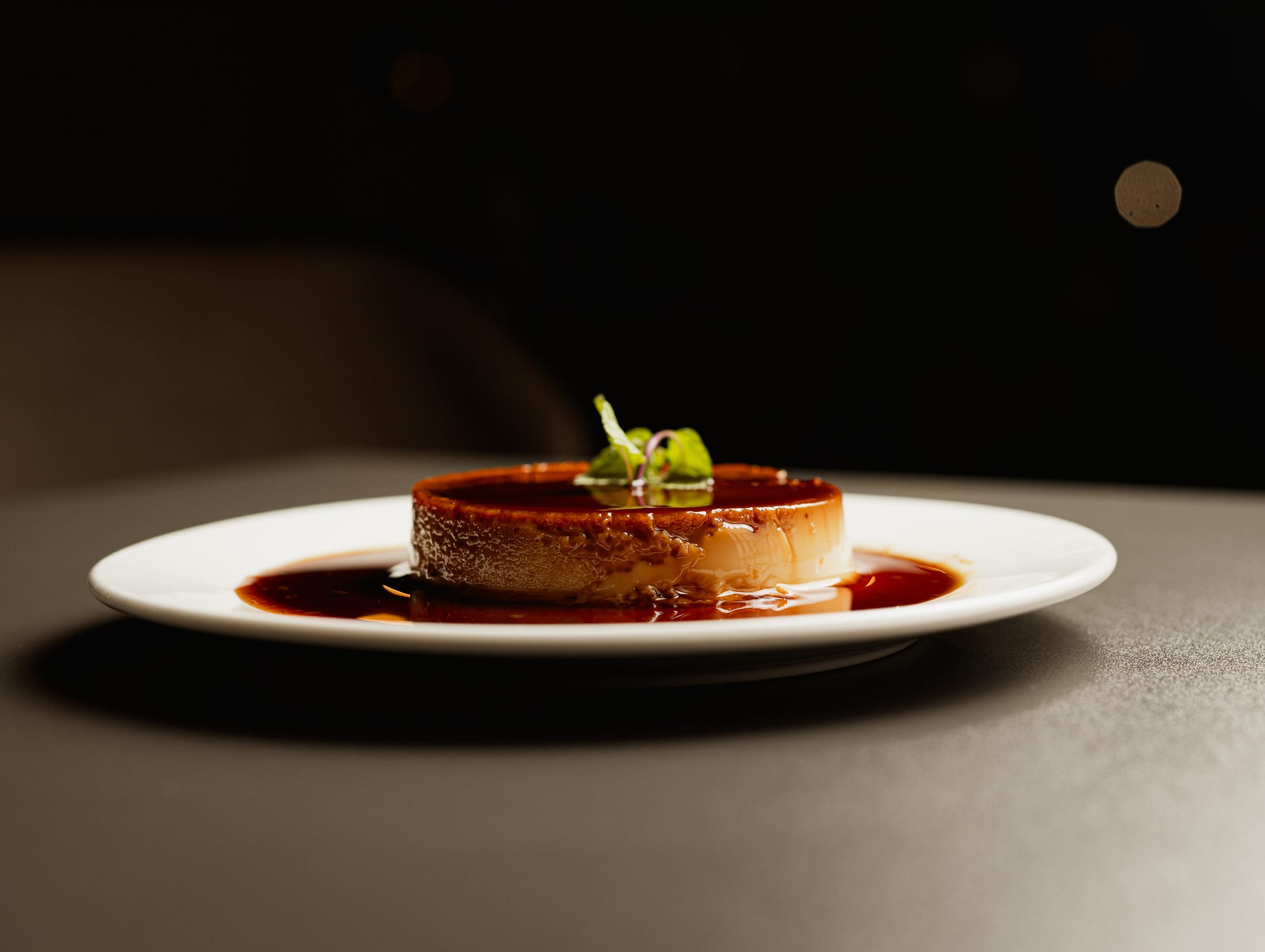 HILITE caramel dessert served on a white plate