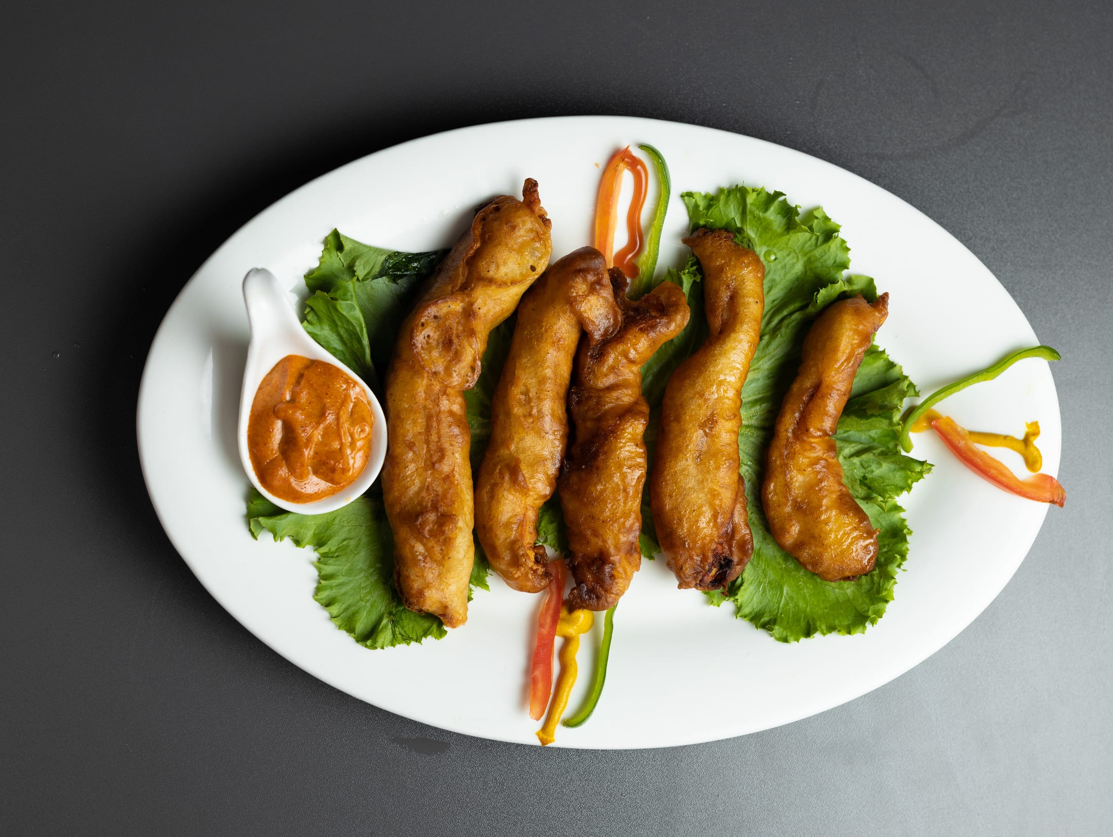 HILITE fried shared starter with dipping sauce and fresh greens